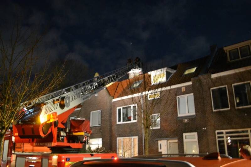 Brand in schoorsteen van woning