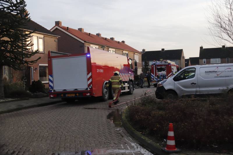 Brand in schuur achter woning