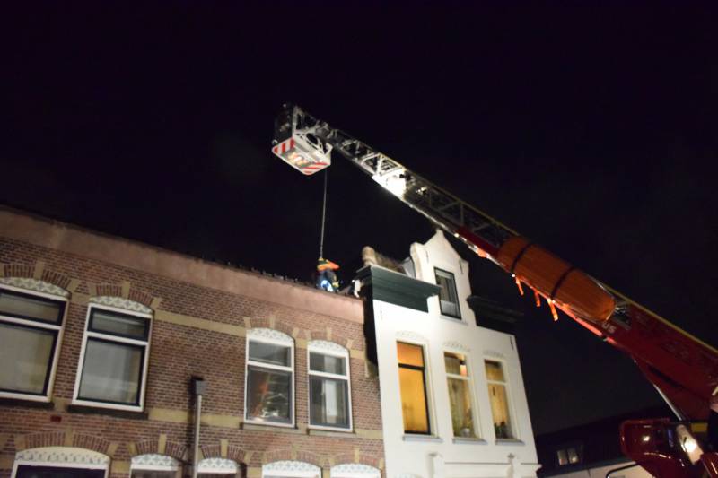 Waterlekkage door afgewaaide dakpannen