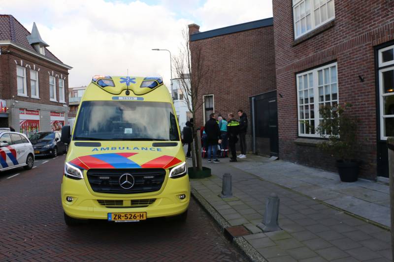 Persoon in scootmobiel ten val