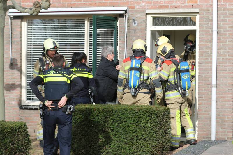 Bewoonster bij brand vast in woning