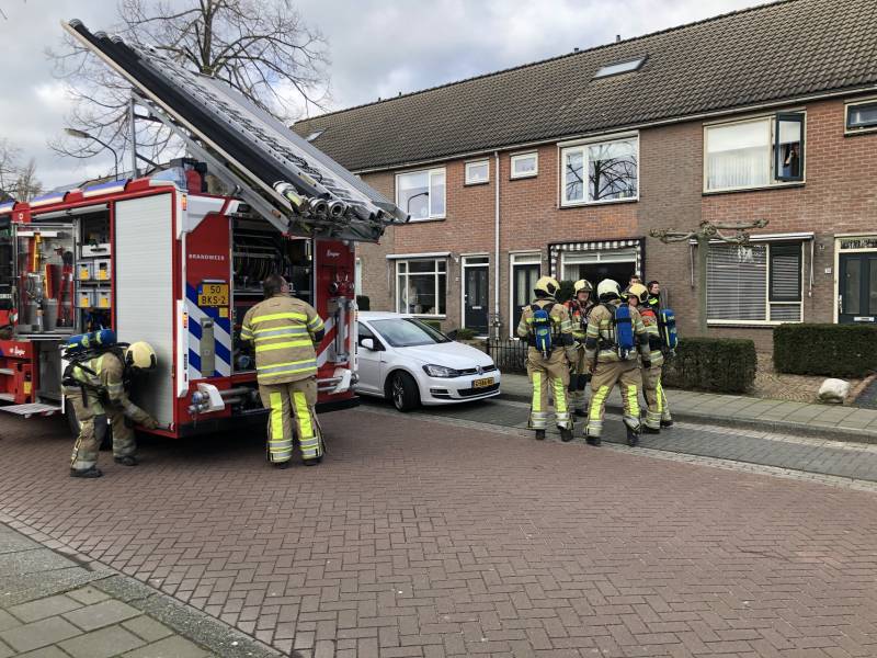 Bewoonster bij brand vast in woning