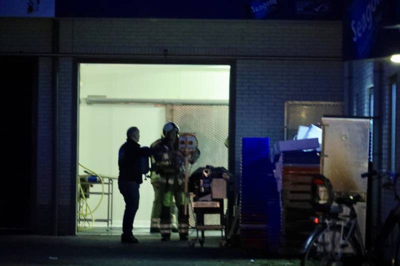 Visgroothandel vol rook na brand in koelcel