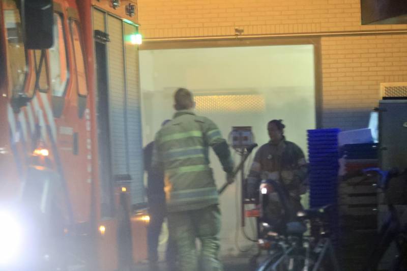 Visgroothandel vol rook na brand in koelcel