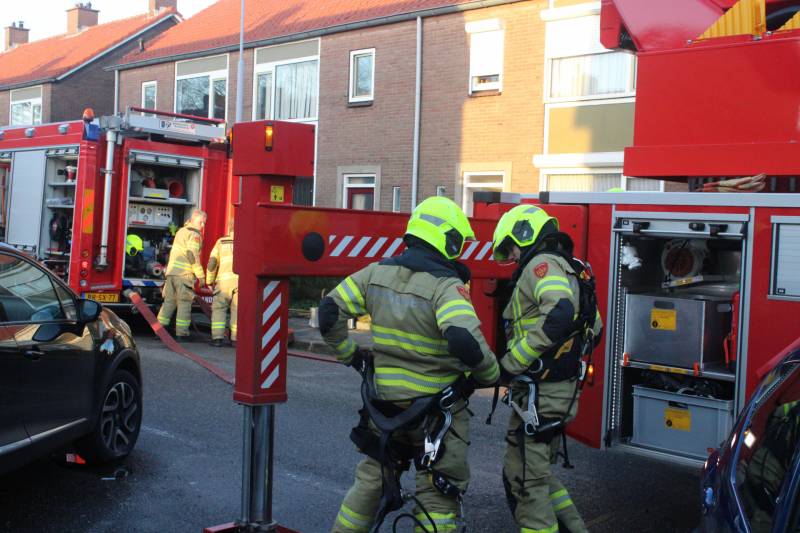 Veel rook bij schoorsteenbrand