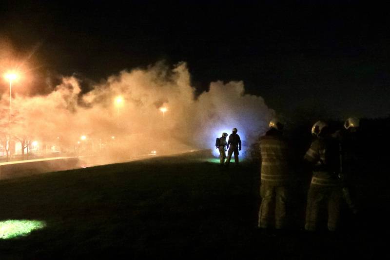 Gedumpte scooter in brand gestoken