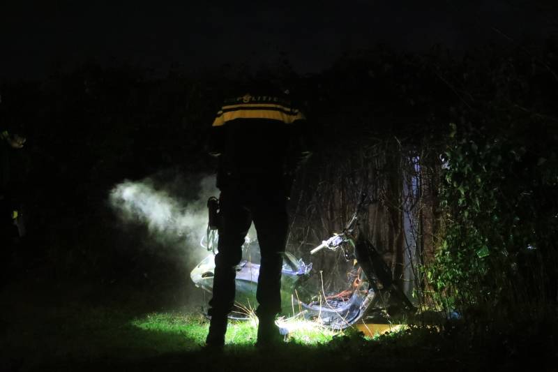 Gedumpte scooter in brand gestoken