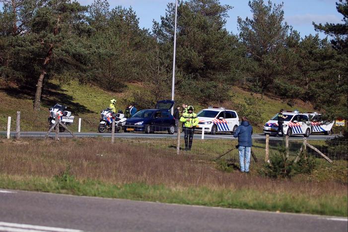 Twee mannen met getrokken wapens aangehouden na achtervolging