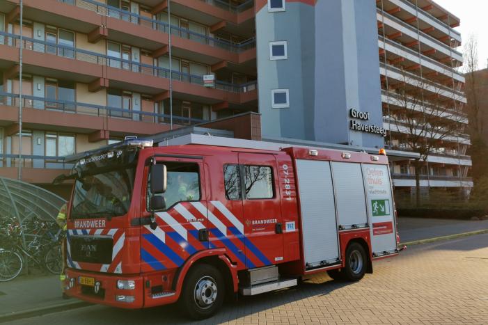 Bewoners tot hun enkels in het water