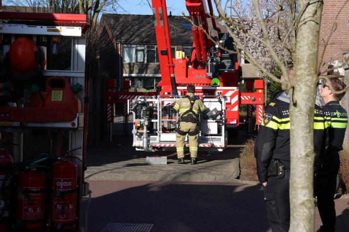 Veel rook bij schoorsteenbrand