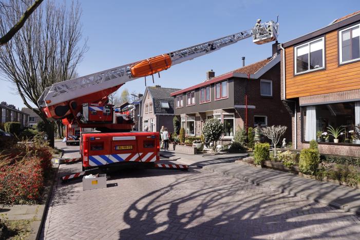 Woning vol rook bij brand in schoorsteen