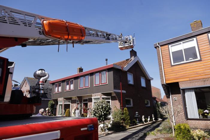 Woning vol rook bij brand in schoorsteen