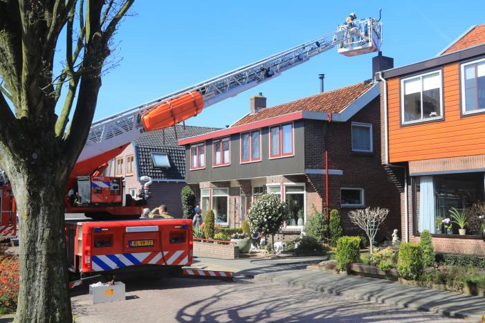 Woning vol rook bij brand in schoorsteen