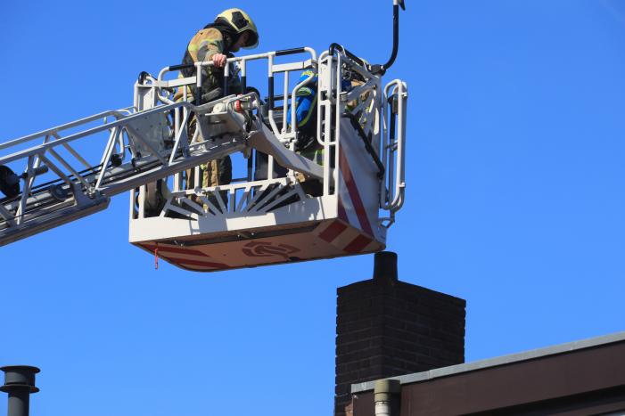 Woning vol rook bij brand in schoorsteen