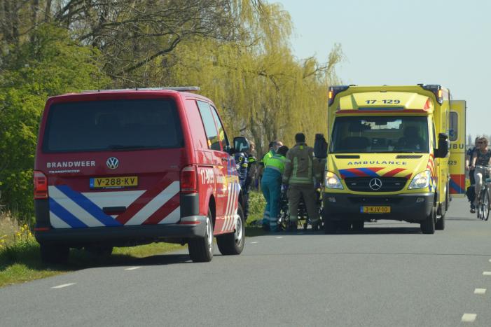 Persoon belandt met scootmobiel in het water