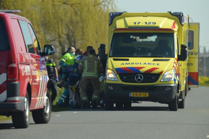 Persoon belandt met scootmobiel in het water