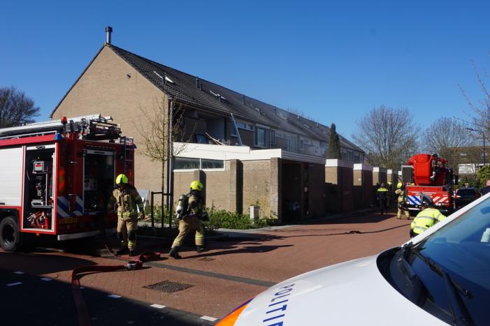 Man in boeien geslagen bij woningbrand