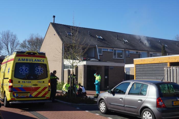 Man in boeien geslagen bij woningbrand