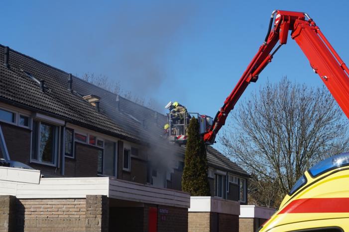 Man in boeien geslagen bij woningbrand