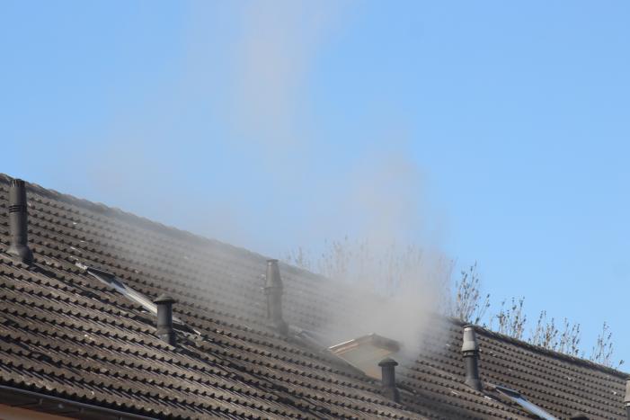 Man in boeien geslagen bij woningbrand