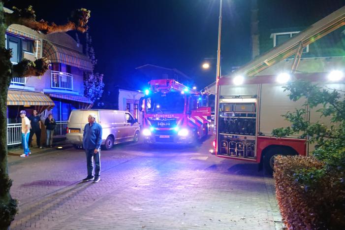 Persoon door het dak van loods gezakt