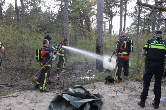 Brand in bos vermoedelijk aangestoken