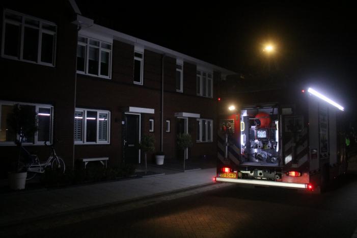 Brandweer opzoek na melding van een woningbrand