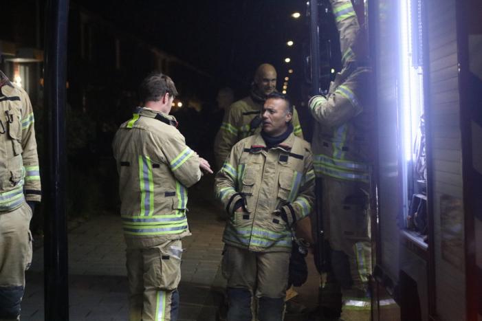 Brandweer opzoek na melding van een woningbrand