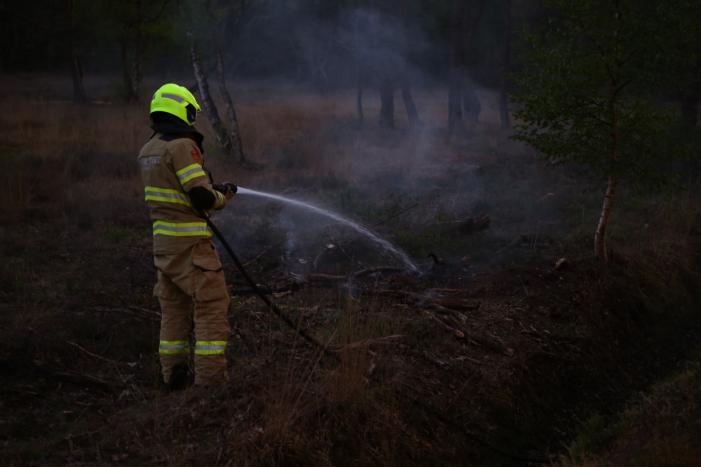 Brandweer blust buitenbrand