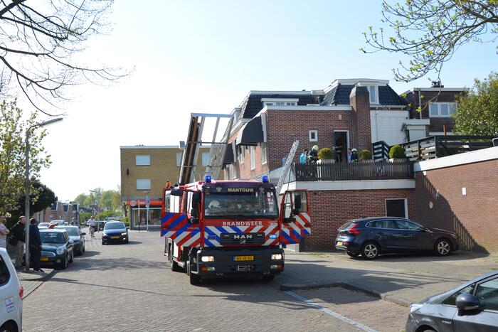 Brand op dakterras van woning
