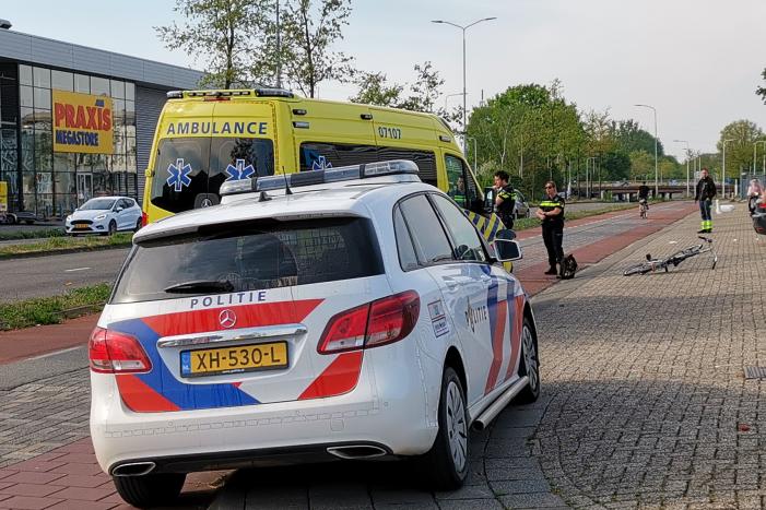 Scooter en fietser klappen op elkaar