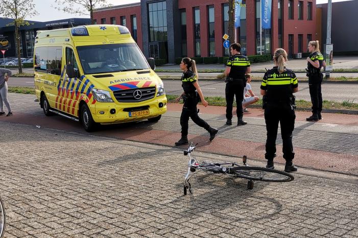 Scooter en fietser klappen op elkaar