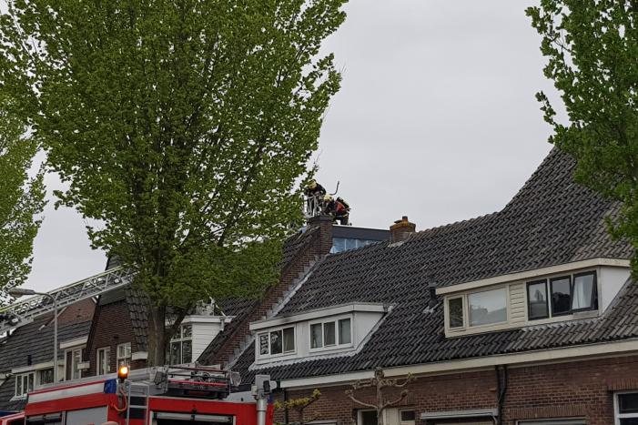 Brand in schoorsteen van woning