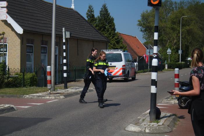 Scooterrijder maakt flinke smak na botsing met auto