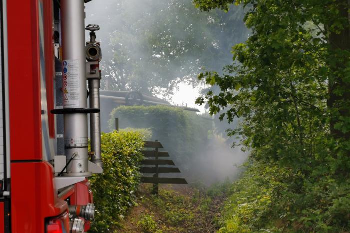 Stuk bosschage in brand