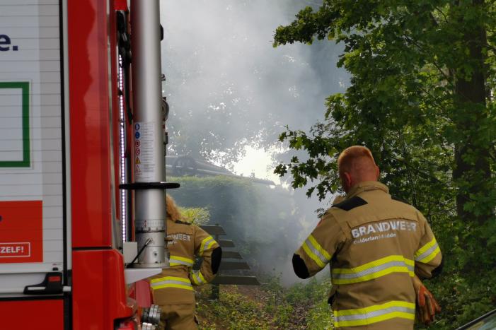 Stuk bosschage in brand