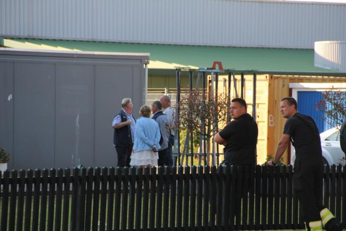 Grote schade aan bedrijfspand door overslaande containerbrand