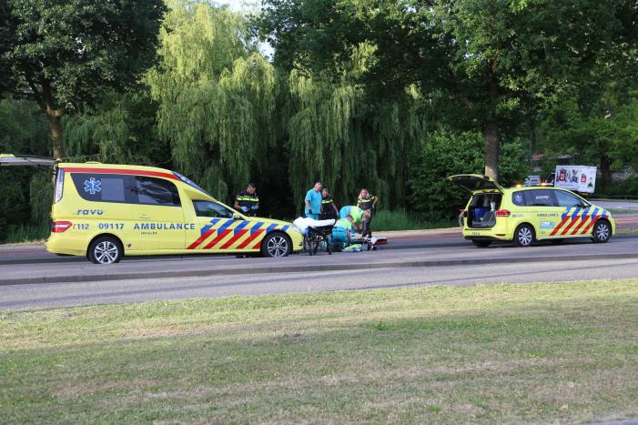 Fietser hard onderuit