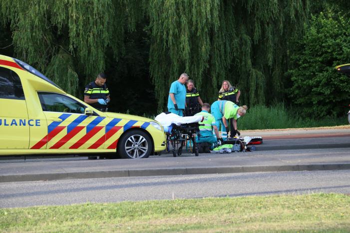 Fietser hard onderuit