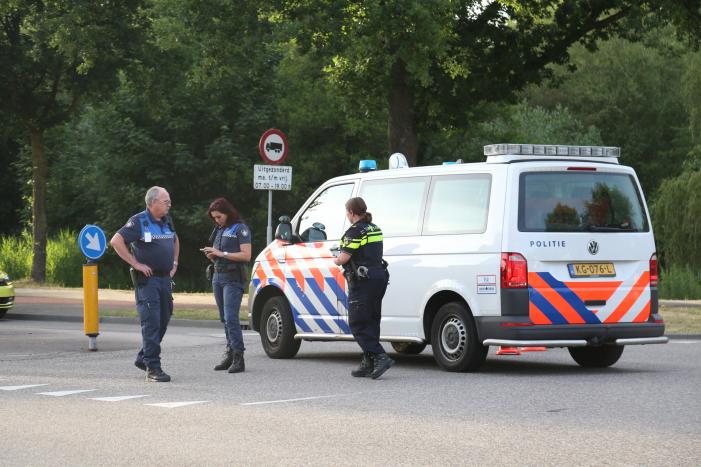 Fietser hard onderuit