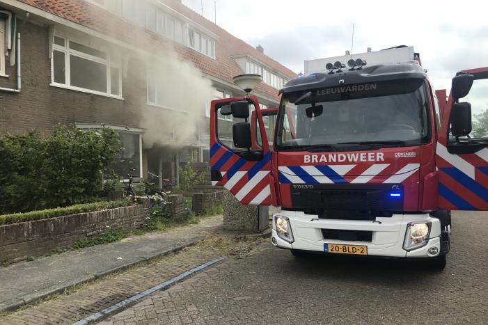 Veel rook bij brand in woning