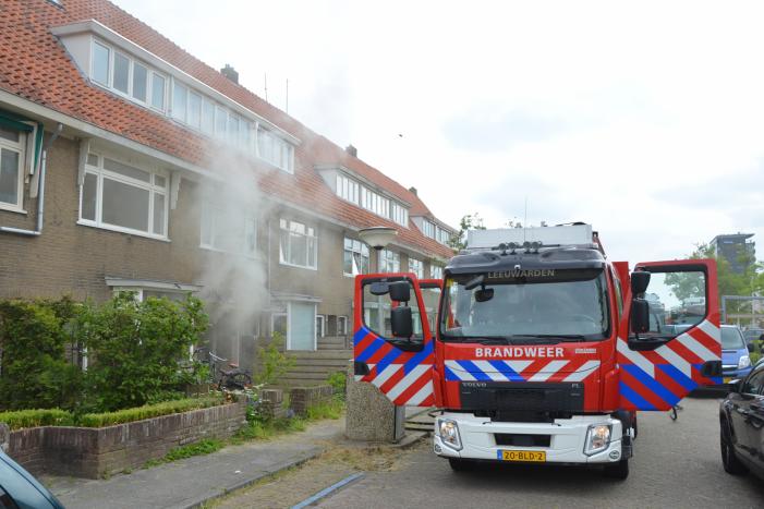 Veel rook bij brand in woning
