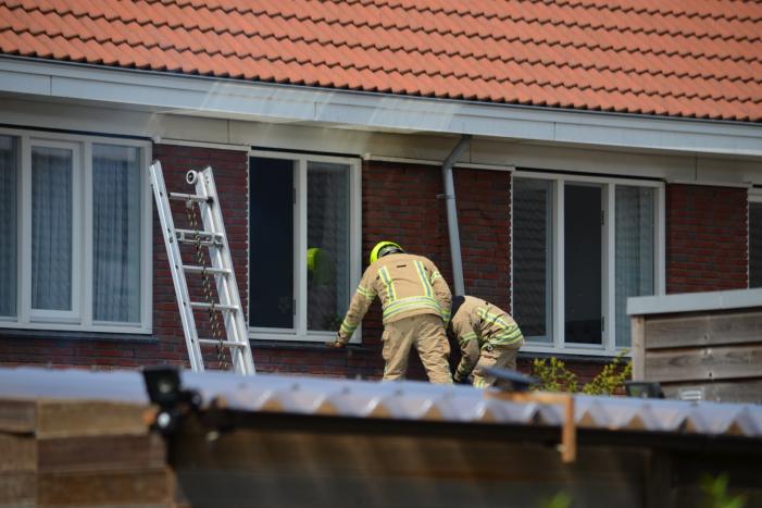 Brand in spouwmuur snel onder controle