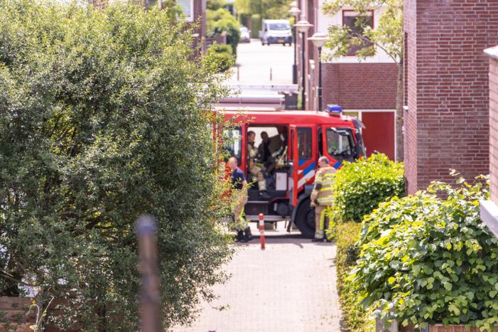 Omwonenden blussen brand met tuinslang