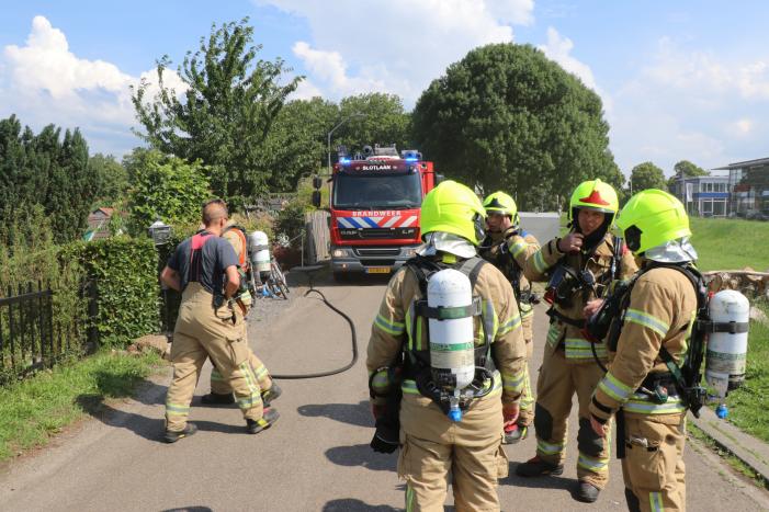 Gewonden bij brand in keuken van woning