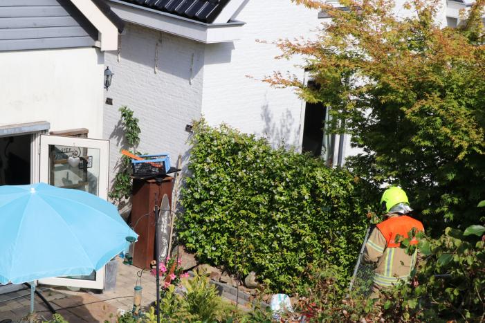 Gewonden bij brand in keuken van woning