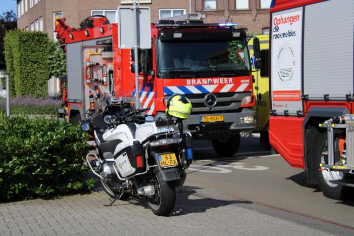 Man bekneld onder volle palletwagen