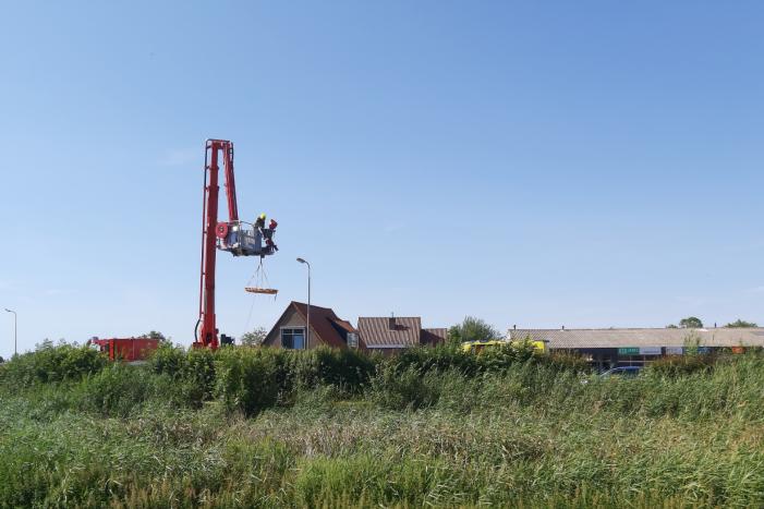 Bestuurder scootmobiel te water