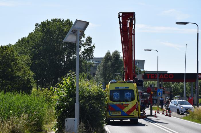 Bestuurder scootmobiel te water