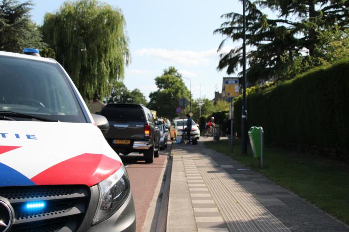Fietsster gewond na aanrijding met auto